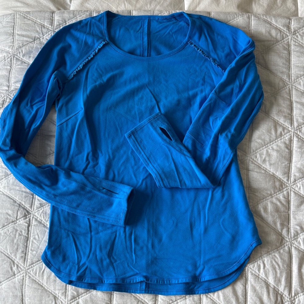 lululemon athletica Vibrant Blue Long Sleeve Top limited edition w ruffles